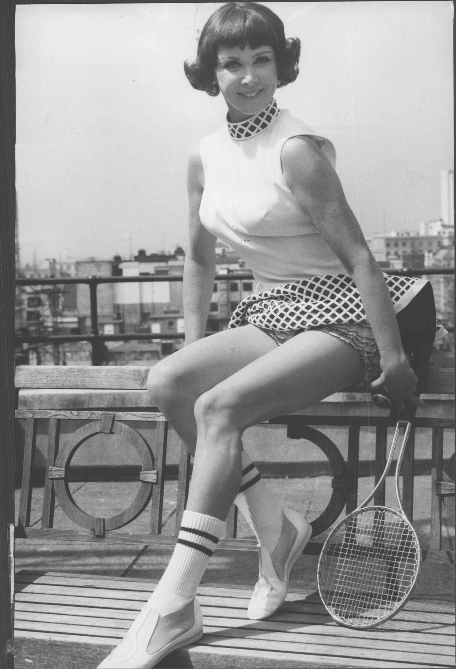 Gussie Moran wearing a pleated skirt